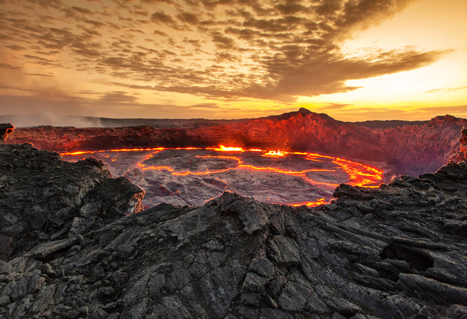 Fumaroles releasing gas near the Dallol crater, creating surreal lunar-like scenery
