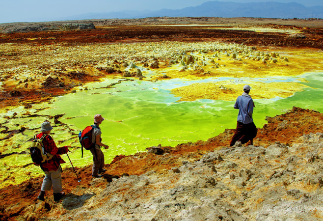 Dallol’s vibrant hydrothermal pools with bright yellow, green, and orange mineral deposits