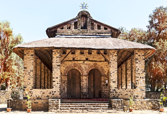 Modest stone exterior of Debre Birhan Selassie Church in Gondar, Ethiopia