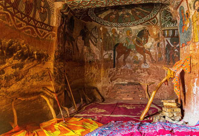 Interior of Abuna Yemata Guh Church decorated with centuries-old Ethiopian Orthodox Christian murals.