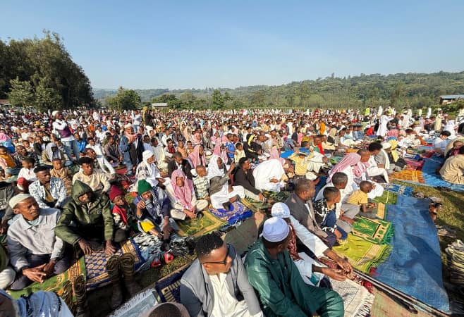 perform prayer and celebrate the eid al adha holiday